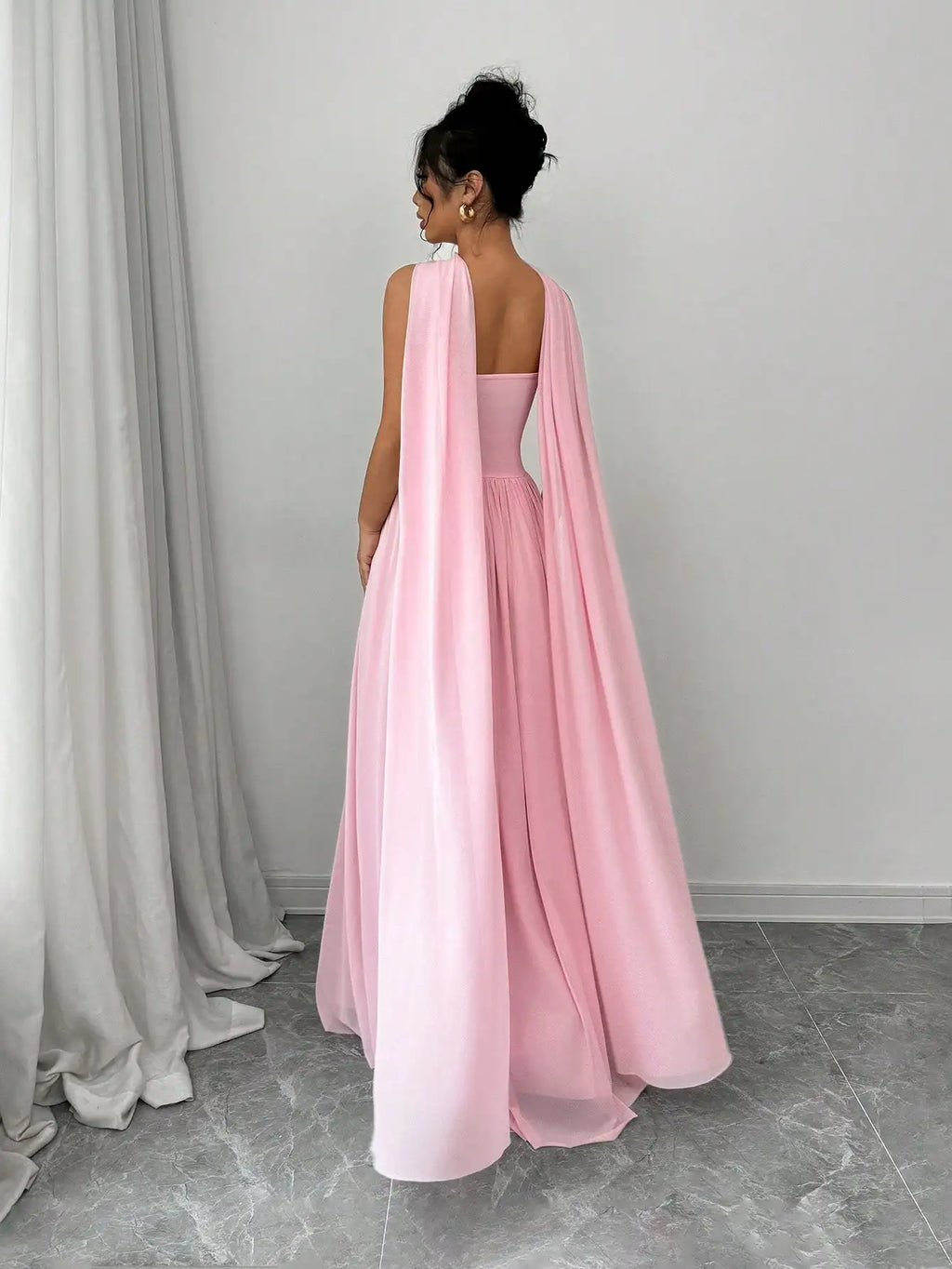 Elegant Solid Pink Sleeveless Maxi Dress With Backless Design And Draped Cape Overlay