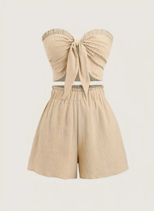 Simple, beachy style, romantic seaside. Date outfit featuring a top with gathered details and shorts, a two-piece set for women.